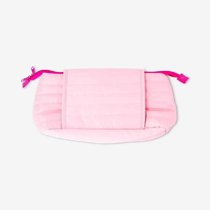 Pink organiser bag for hair styling tools