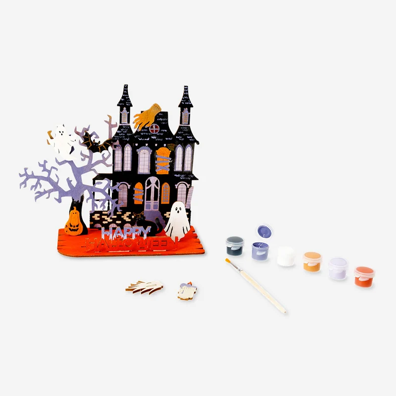 DIY haunted house with paint and brush
