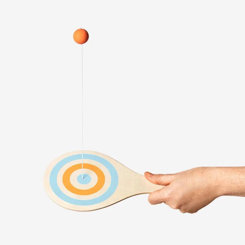 Wooden bat with ball on string