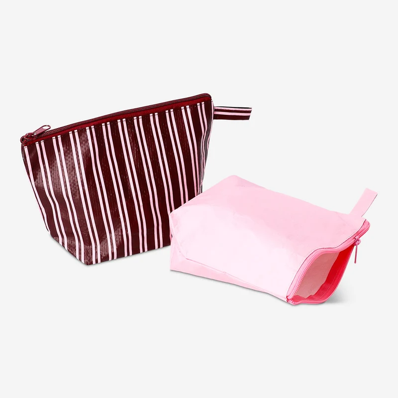 Pink and brown toiletry bags